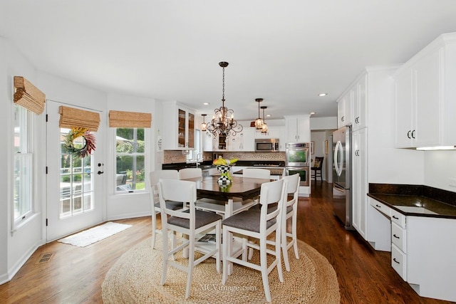 24255 Cropland Dr, Plainfield, IL 60544 - dining room featuring a chandelier, dark wood-style floors, and recessed lighting