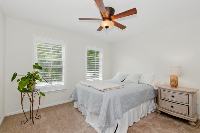 24255 Cropland Dr, Plainfield, IL 60544 - bedroom with light carpet, baseboards, and ceiling fan