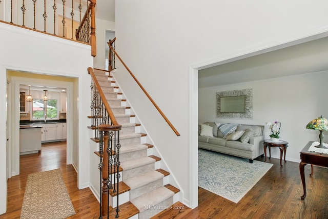 24255 Cropland Dr, Plainfield, IL 60544 - staircase featuring wood finished floors and baseboards