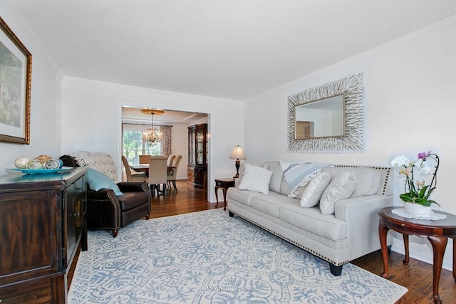 24255 Cropland Dr, Plainfield, IL 60544 - living area with wood finished floors, a chandelier, and crown molding