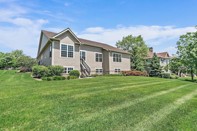 23521 N Sanctuary Club Dr, Kildeer, IL 60047 - rear view of property with a yard