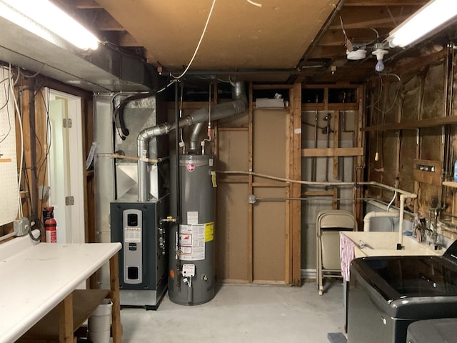 624 Catalpa Ln, Bartlett, IL 60103 - unfinished below grade area featuring gas water heater, washer / clothes dryer, and heating unit
