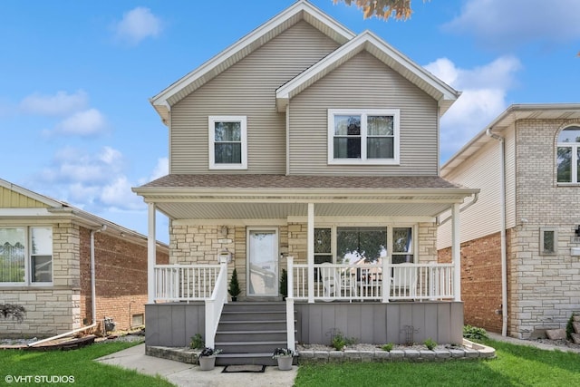 1933 N 75th Ave, Elmwood Park, IL 60707 - view of front of house with a porch and roof with shingles