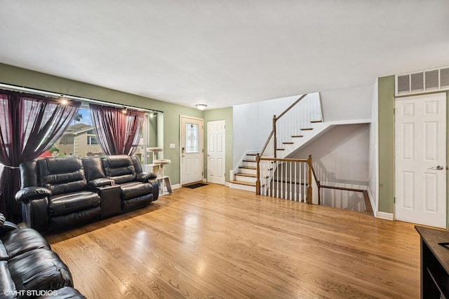 1933 N 75th Ave, Elmwood Park, IL 60707 - living area with wood finished floors and healthy amount of natural light