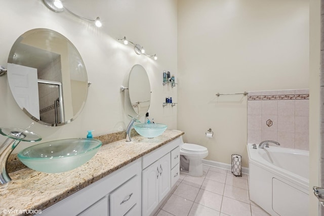1933 N 75th Ave, Elmwood Park, IL 60707 - bathroom with tile patterned floors, a garden tub, double vanity, and a shower with door