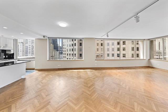 1000 N Lake Shore Plz Unit 17C, Chicago, IL 60611 - unfurnished living room featuring baseboards