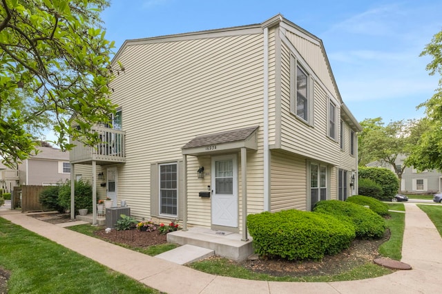 1693 Ashburn Ct Unit B, Wheaton, IL 60189 - view of property featuring a balcony and central AC