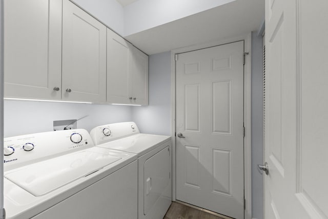 1693 Ashburn Ct Unit B, Wheaton, IL 60189 - washroom with cabinet space, washer and clothes dryer, and dark wood finished floors