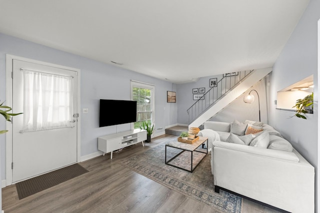 1693 Ashburn Ct Unit B, Wheaton, IL 60189 - living room featuring stairs, wood finished floors, and baseboards