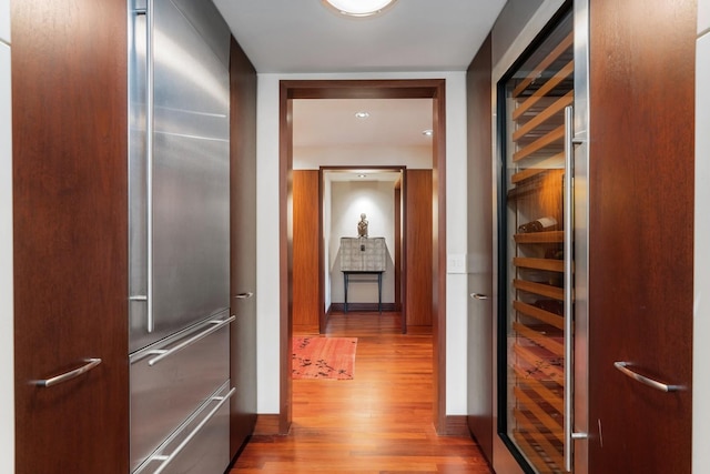 161 E Chicago Ave Unit 33De, Chicago, IL 60611 - corridor with light wood-style floors, beverage cooler, and recessed lighting