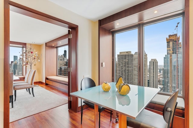 161 E Chicago Ave Unit 33De, Chicago, IL 60611 - dining area with wood finished floors and a view of skyline