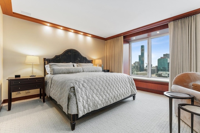 161 E Chicago Ave Unit 33De, Chicago, IL 60611 - bedroom featuring light colored carpet, a view of skyline, and crown molding