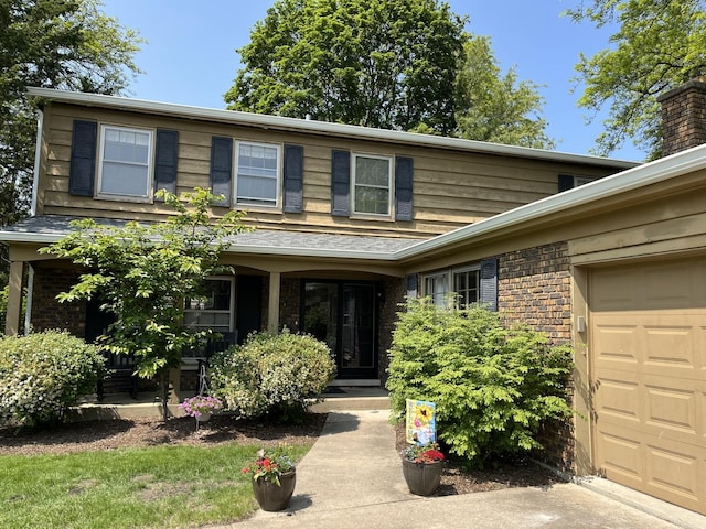 1539 Wincanton Dr, Deerfield, IL 60015 - doorway to property featuring brick siding and a garage