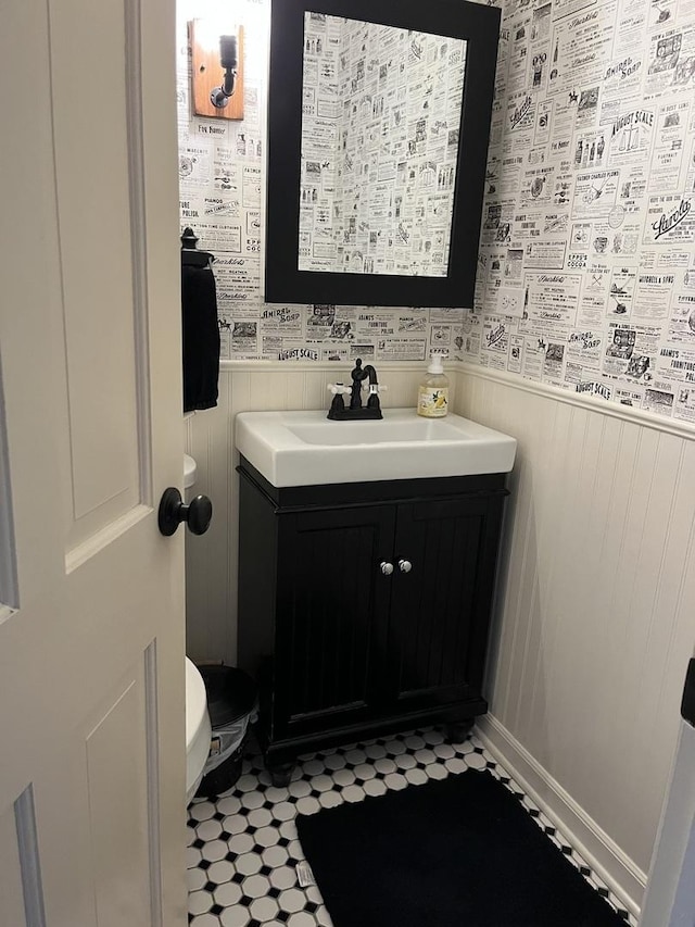 1539 Wincanton Dr, Deerfield, IL 60015 - bathroom with vanity, wainscoting, and wallpapered walls