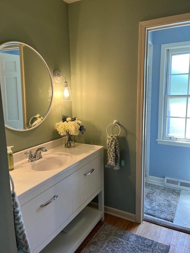 1539 Wincanton Dr, Deerfield, IL 60015 - bathroom featuring vanity and wood finished floors