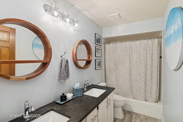 3022 Woods Creek Ln, Algonquin, IL 60102 - bathroom featuring double vanity, toilet, shower / bath combination with curtain, and wood finished floors