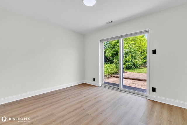 11617 S Kedzie Ave, Merrionette Park, IL 60803 - unfurnished room with wood finished floors and baseboards