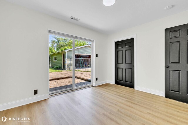 11617 S Kedzie Ave, Merrionette Park, IL 60803 - unfurnished room with baseboards, wood finished floors, and a smoke detector
