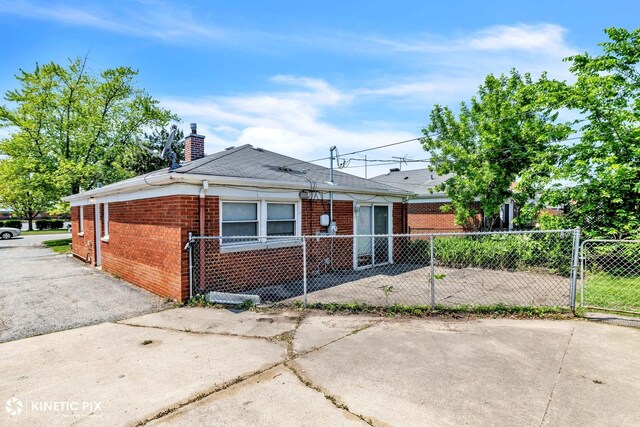 11617 S Kedzie Ave, Merrionette Park, IL 60803 - view of front of house featuring brick siding and a chimney