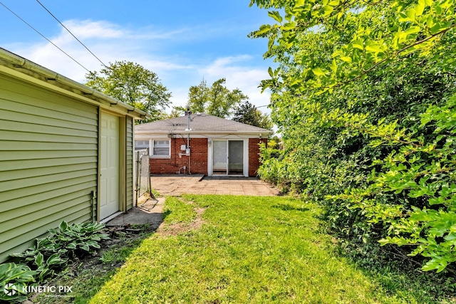 11617 S Kedzie Ave, Merrionette Park, IL 60803 - view of green lawn with a patio area