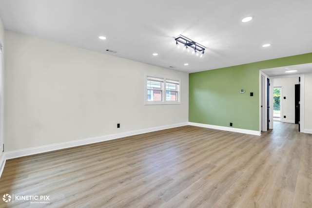 11617 S Kedzie Ave, Merrionette Park, IL 60803 - empty room featuring recessed lighting, plenty of natural light, light wood-type flooring, and baseboards