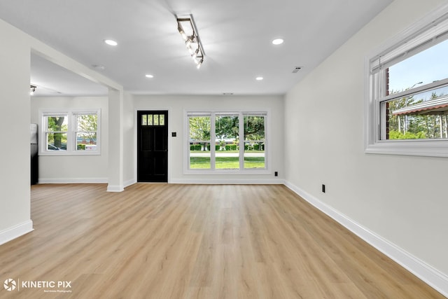 11617 S Kedzie Ave, Merrionette Park, IL 60803 - entryway with baseboards, light wood-style floors, recessed lighting, and rail lighting
