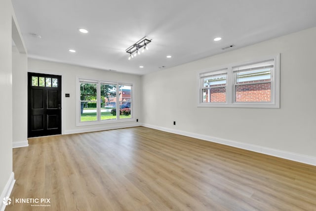 11617 S Kedzie Ave, Merrionette Park, IL 60803 - spare room with light wood-style flooring, baseboards, and recessed lighting