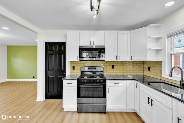 11617 S Kedzie Ave, Merrionette Park, IL 60803 - kitchen featuring stainless steel appliances, a sink, baseboards, light wood finished floors, and recessed lighting