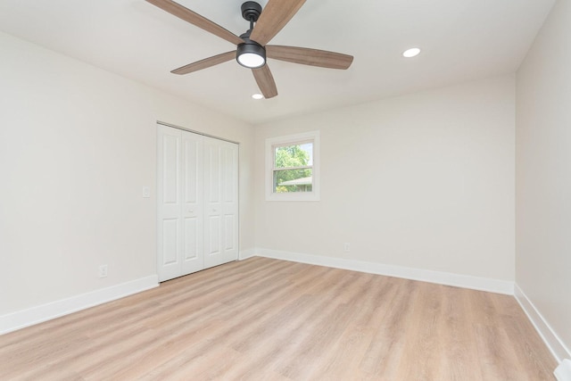 3100 Galena Dr, Joliet, IL 60435 - unfurnished bedroom with light wood finished floors, a closet, recessed lighting, and a ceiling fan
