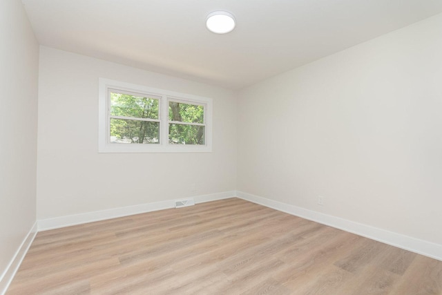 3100 Galena Dr, Joliet, IL 60435 - empty room featuring light wood-style floors and baseboards