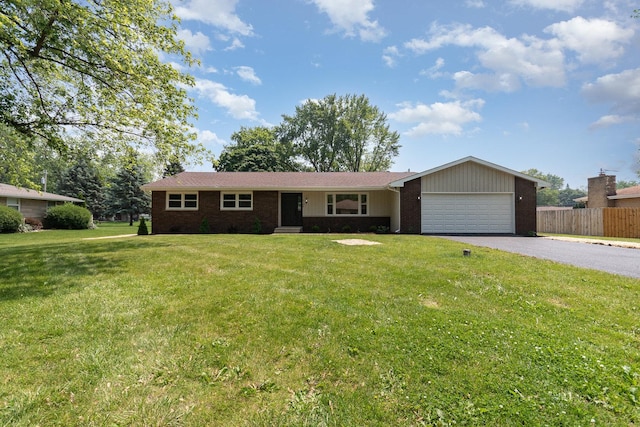 3100 Galena Dr, Joliet, IL 60435 - ranch-style house with driveway, a garage, and brick siding