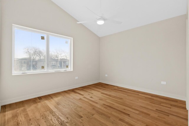 6513 S Langley Ave, Chicago, IL 60637 - spare room with vaulted ceiling, light wood finished floors, a ceiling fan, and baseboards