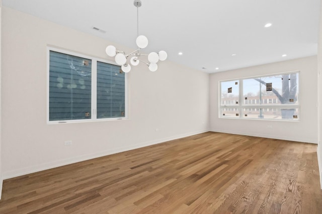6513 S Langley Ave, Chicago, IL 60637 - spare room with wood finished floors, recessed lighting, baseboards, and a chandelier