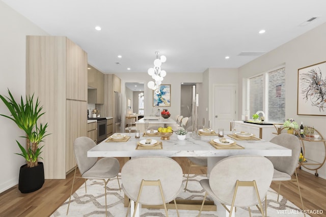 6513 S Langley Ave, Chicago, IL 60637 - dining area with light wood-type flooring and recessed lighting