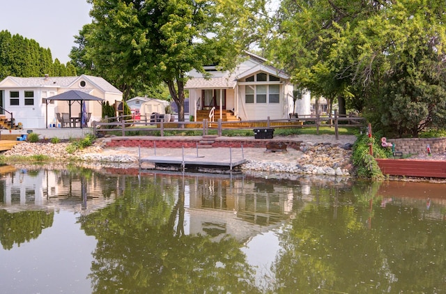 166 Fossil Cove Ln, Wilmington, IL 60481 - back of house with a water view and a gazebo
