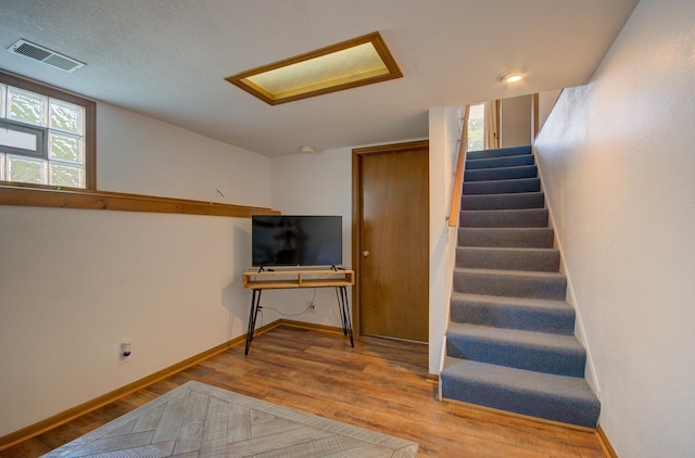 166 Fossil Cove Ln, Wilmington, IL 60481 - staircase featuring wood finished floors and baseboards