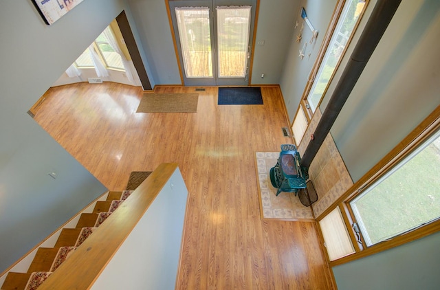 166 Fossil Cove Ln, Wilmington, IL 60481 - unfurnished living room with wood finished floors and plenty of natural light