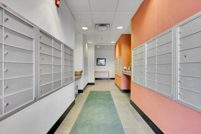 9355 Irving Park Rd Unit 506, Schiller Park, IL 60176 - view of home's community featuring mail area, recessed lighting, a drop ceiling, and a package area