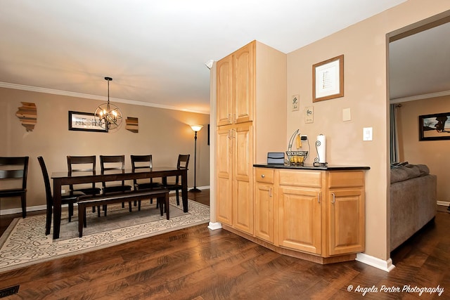 909 Aimtree Pl, Schaumburg, IL 60194 - dining space with dark wood-type flooring, baseboards, a chandelier, and crown molding