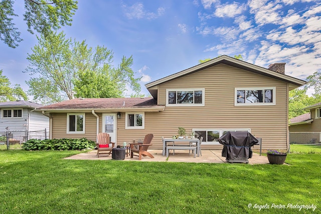 909 Aimtree Pl, Schaumburg, IL 60194 - rear view of house with a chimney and a patio