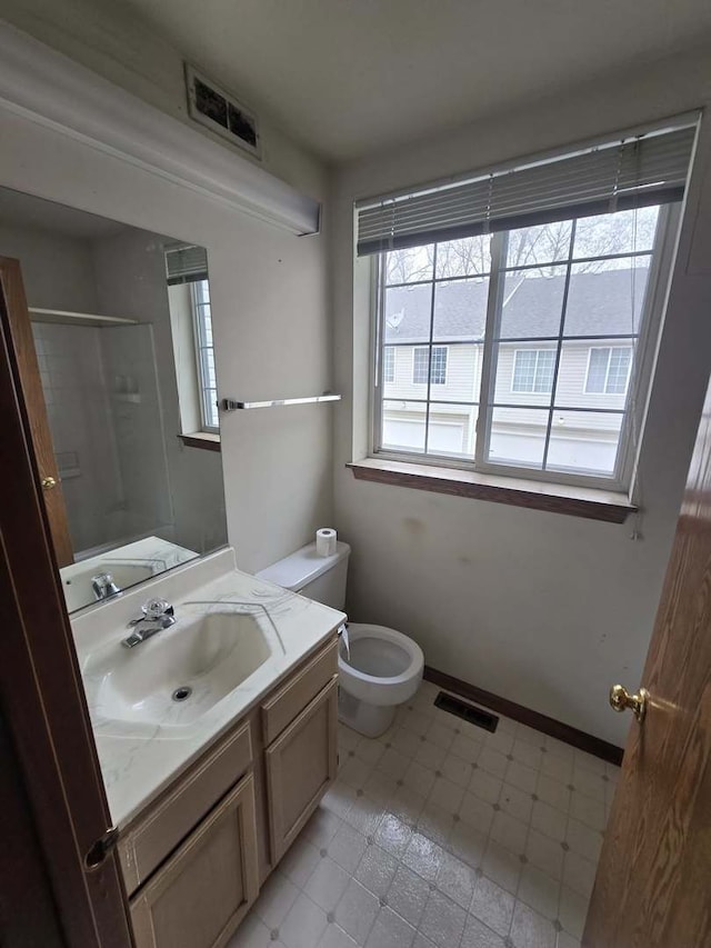 19 N Macgillis Dr Unit 19, Round Lake, IL 60073 - full bath with toilet, vanity, an enclosed shower, and tile patterned floors