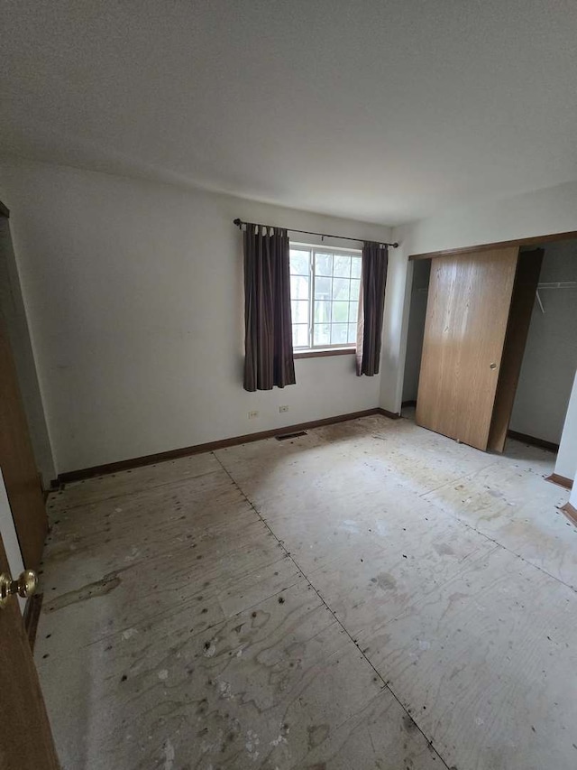 19 N Macgillis Dr Unit 19, Round Lake, IL 60073 - unfurnished bedroom featuring baseboards