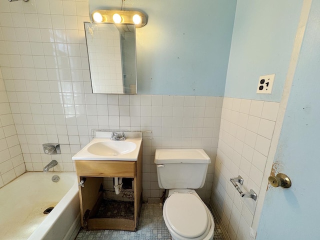 7514 S Rhodes Ave, Chicago, IL 60619 - full bathroom with toilet, a sink, and tile walls