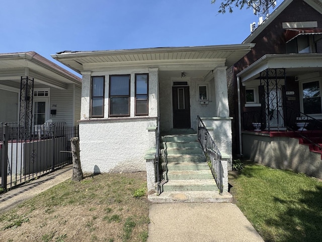 7514 S Rhodes Ave, Chicago, IL 60619 - view of front facade featuring covered porch