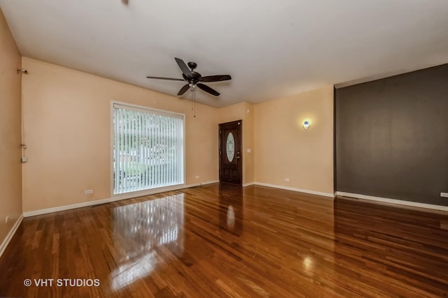 4453 S Berkeley Ave Unit 1, Chicago, IL 60653 - unfurnished room featuring wood finished floors, a ceiling fan, and baseboards