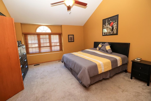 523 Jaquays St, Lockport, IL 60441 - bedroom with light colored carpet, vaulted ceiling, and ceiling fan