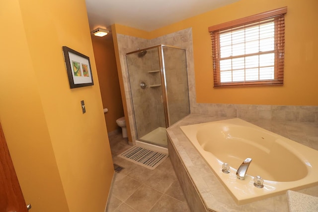 523 Jaquays St, Lockport, IL 60441 - bathroom with a garden tub, a stall shower, toilet, and tile patterned flooring