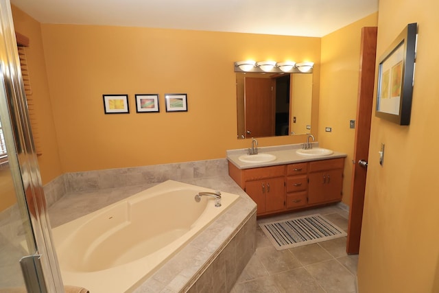 523 Jaquays St, Lockport, IL 60441 - bathroom featuring a garden tub, double vanity, and tile patterned floors
