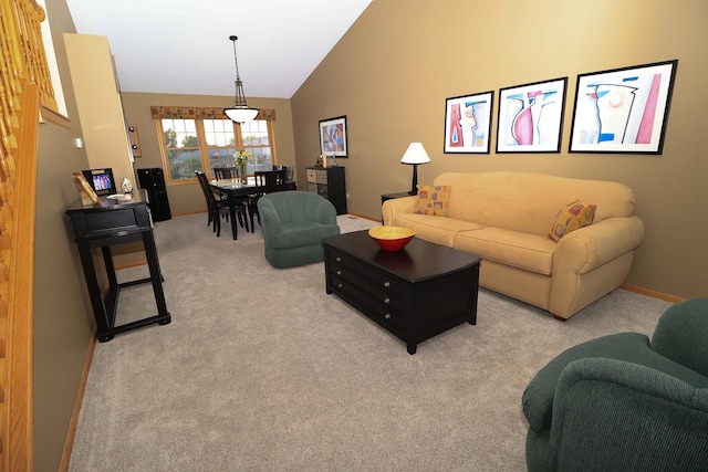 523 Jaquays St, Lockport, IL 60441 - living room featuring lofted ceiling, light colored carpet, and baseboards