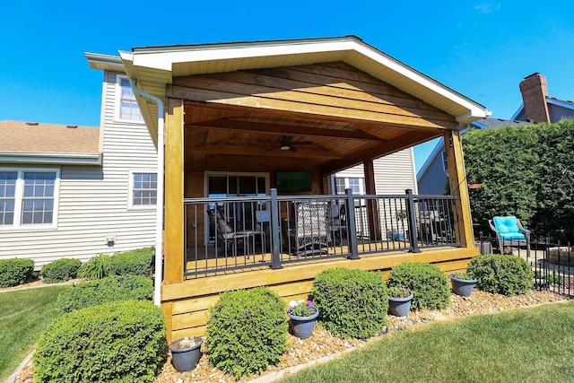 523 Jaquays St, Lockport, IL 60441 - rear view of house featuring a ceiling fan and a wooden deck